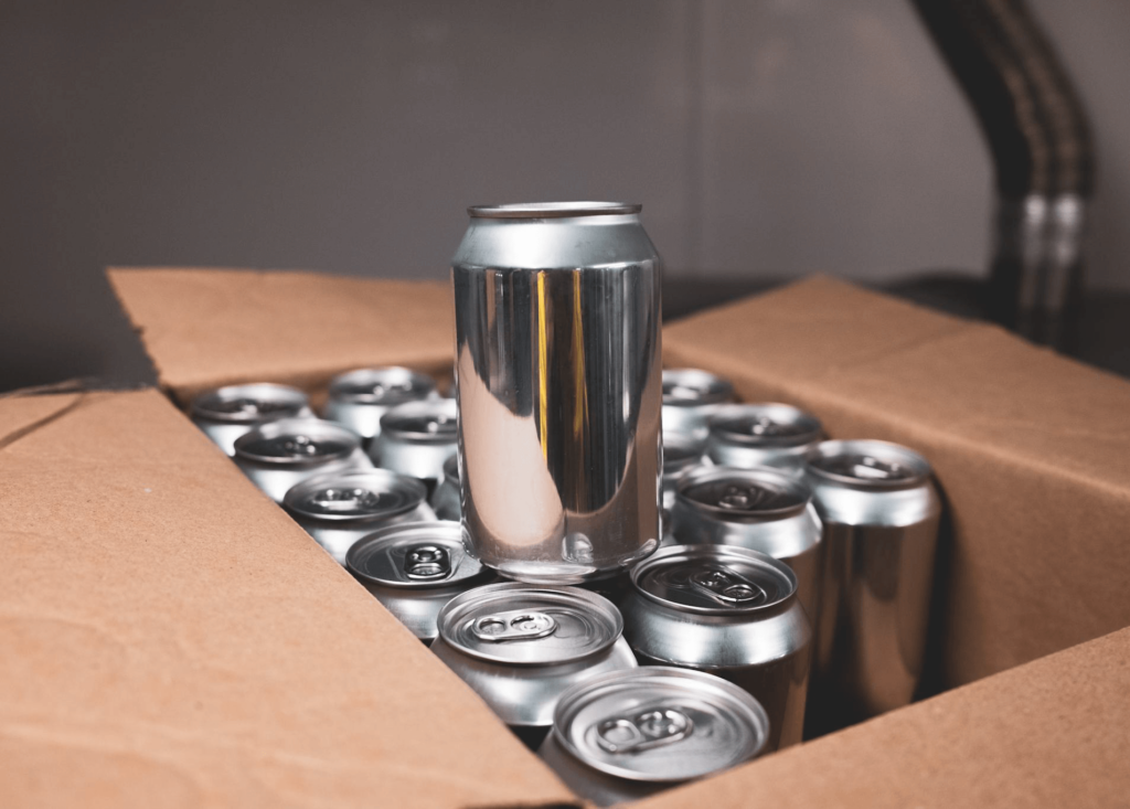 beer cans in box without labels